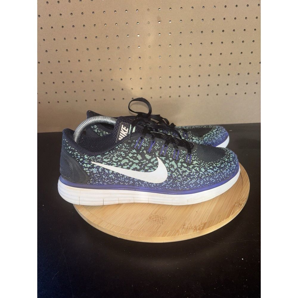 Nike Women’s Black, White, Blue Athletic Running Shoes